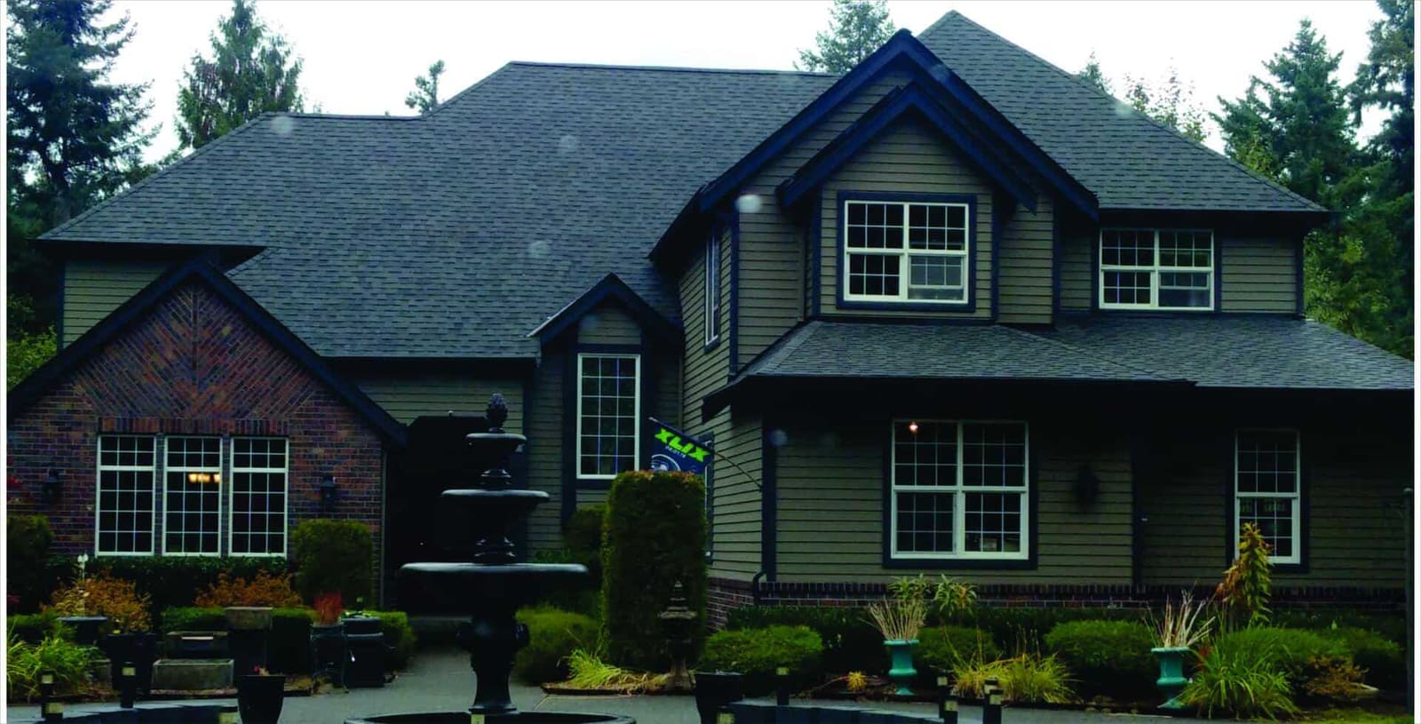 Completed composition shingle roof by Ampro Builders on a two-story Puget Sound home